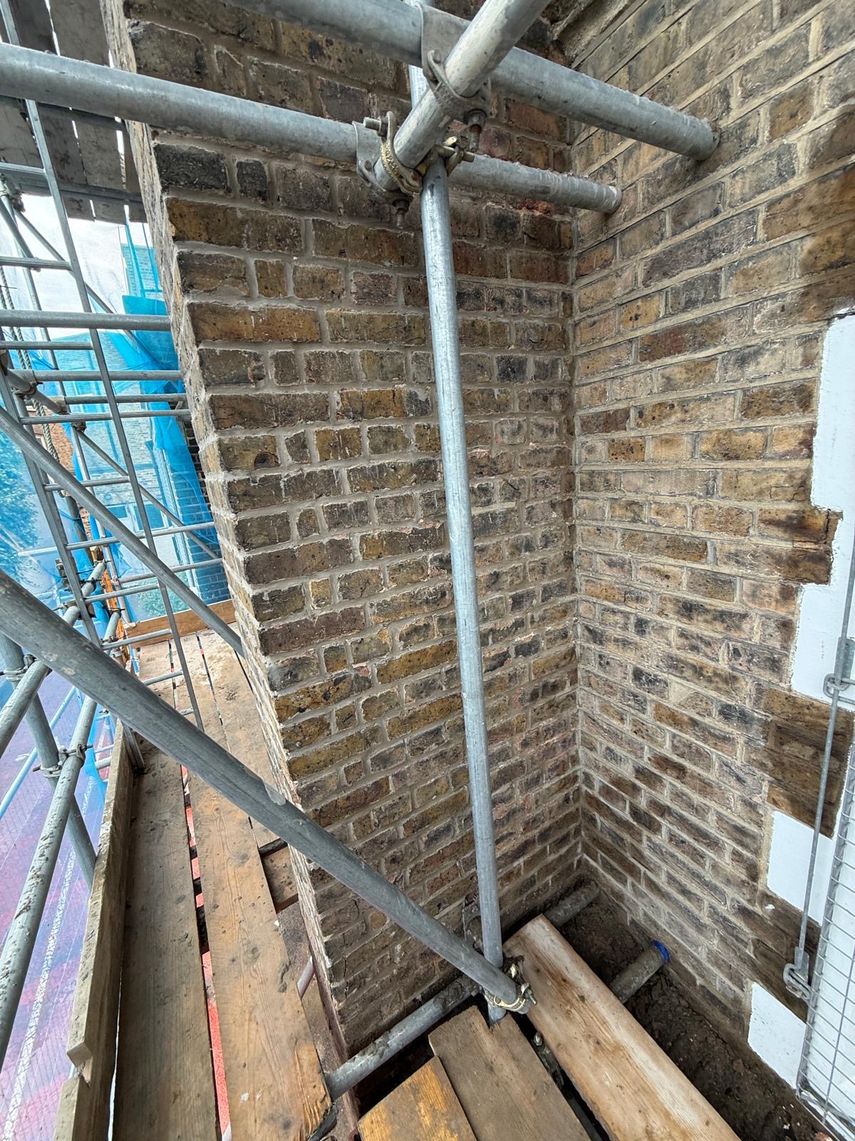 Detailed view of repointed brickwork around an external corner